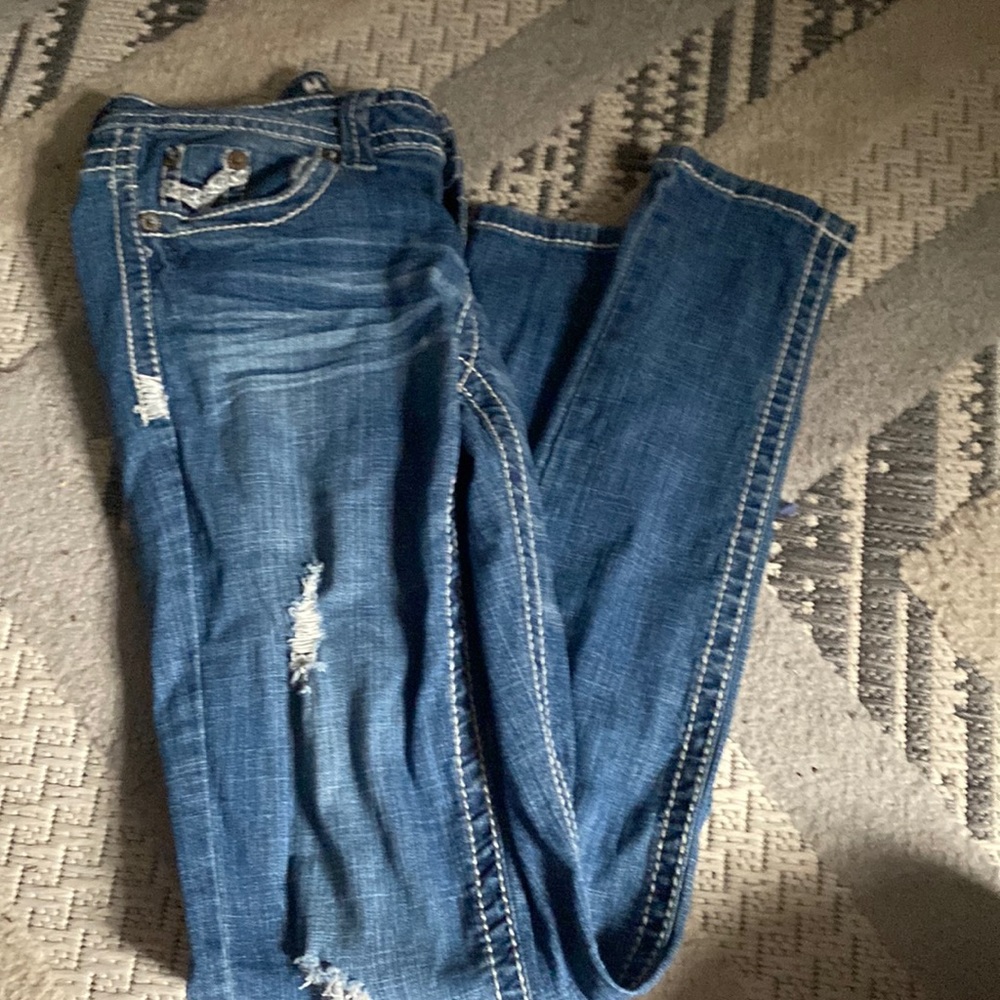 y2k low rise skinny lightly torn jeans